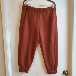 Jogger pant /size m.             burnt orange color